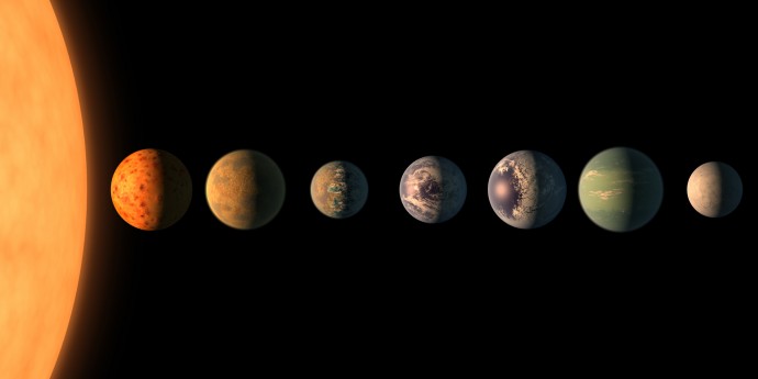 트라피스트 항성계의 상상도. 행성 7개 중 6개가 지구와 유사한 환경일 것으로 예상하고 있다. - NASA 제공